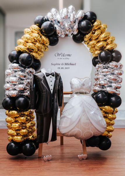 Girlandenbogen aus Cluster in silber und gold zur Hochzeitsdekoration